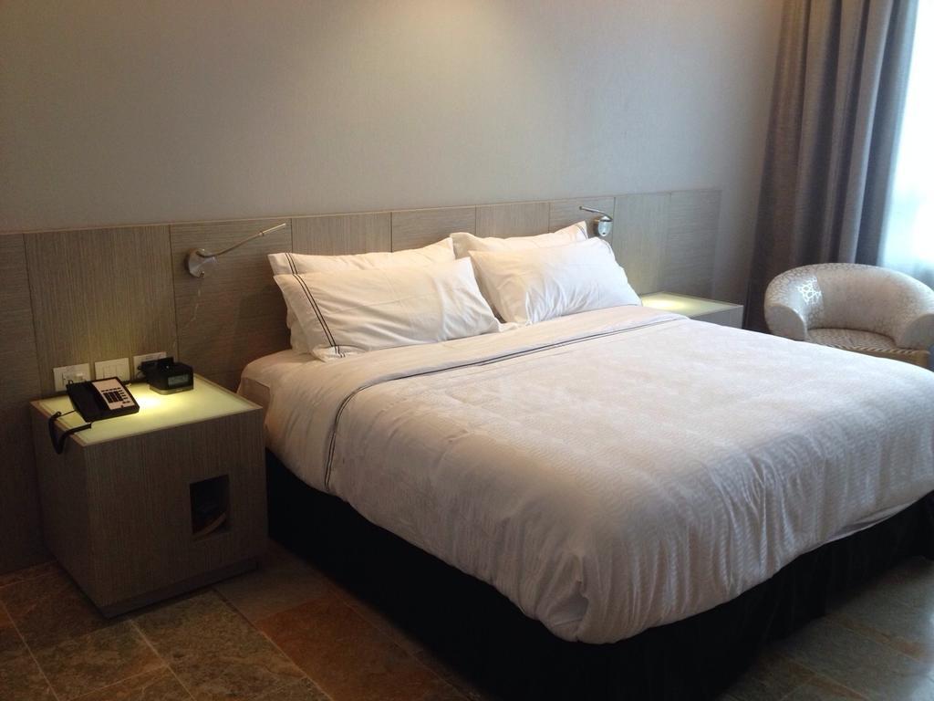 Ghl Hotel Monteria Montería Quarto foto A room at the hotel