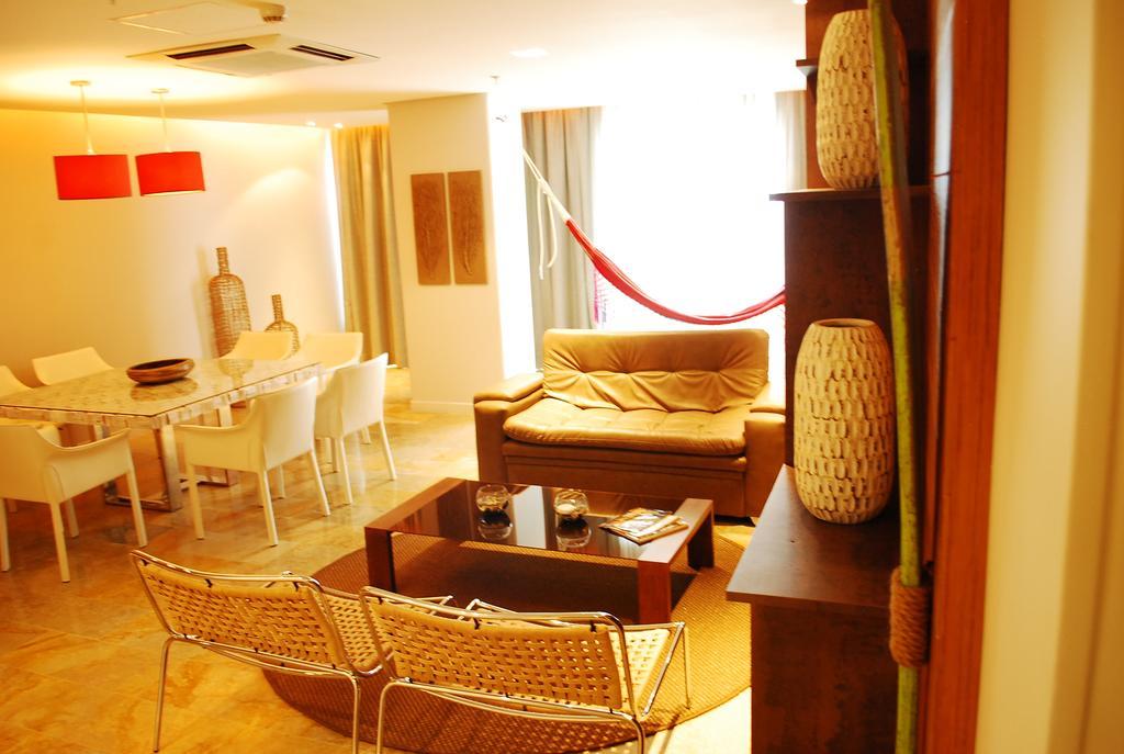 Ghl Hotel Monteria Montería Quarto foto A living room in a typical apartment